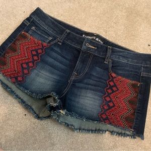 Express NWOT embroidered jean shorts. Hard to find.